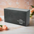 An elegant charcoal gift box with the Churchill's Fine Teas logo, containing a set of tea tins.