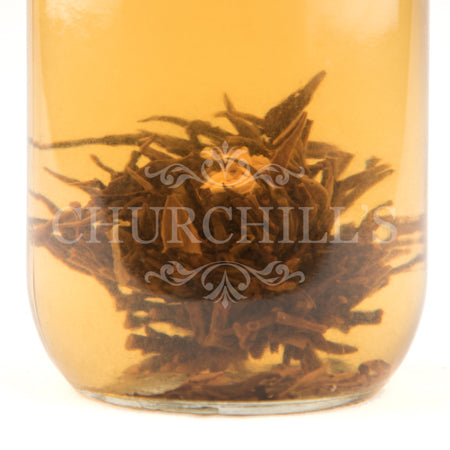 Tiffany Rose Bud Blooming Green Tea (brewed, side view)